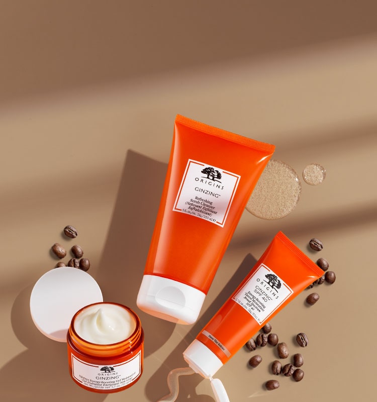 Coffee with skincare regimen on brown background
